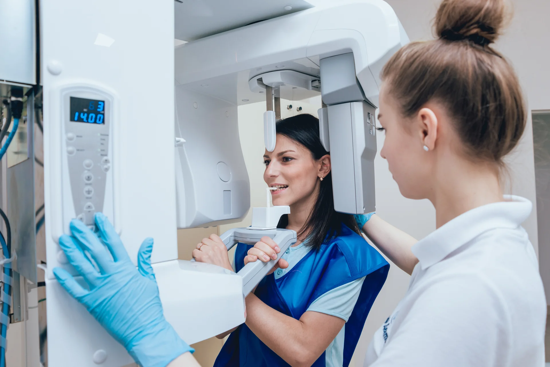Clinician and patient talking through first-visit exam details