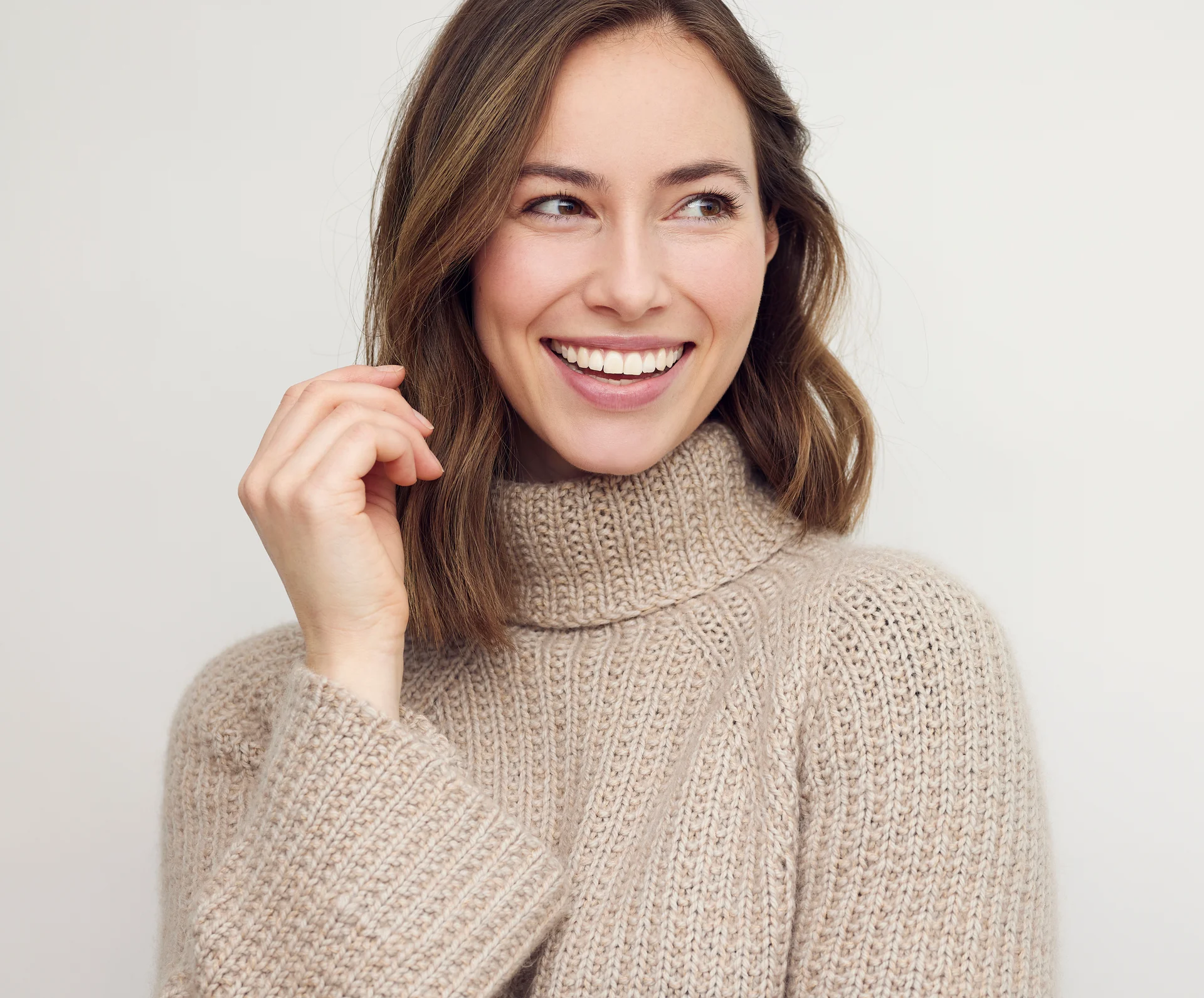 Woman with a bright natural aesthetic smile